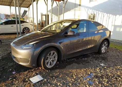 2023 Tesla Model Y из США, поврежденный, VIN 7SAYGDEE8PF861550